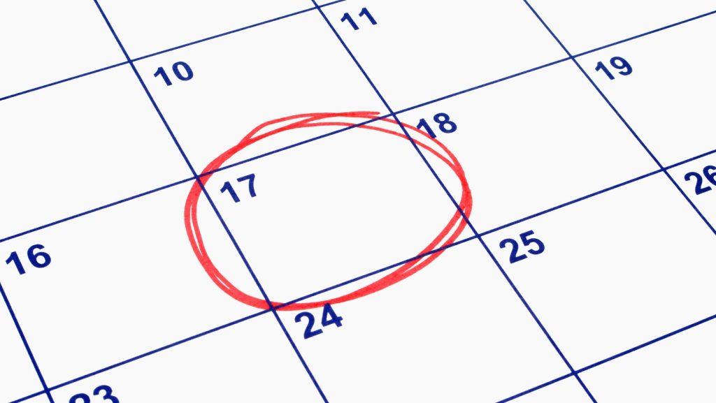 A calendar with a red circle around the 17th.